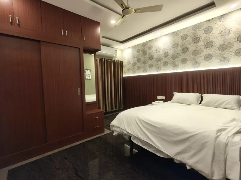 2 BHK bedroom with large sliding wardrobe