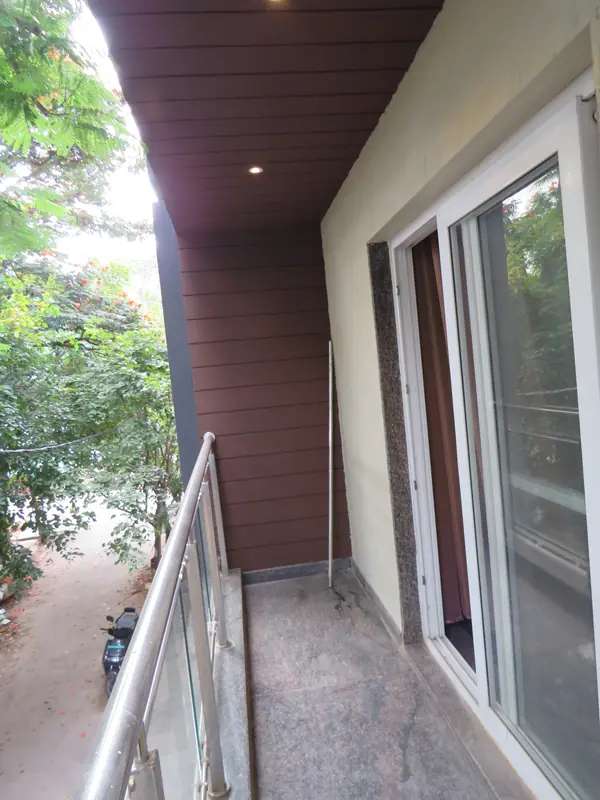 Balcony overlooking green trees