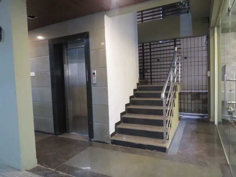 Lift and staircase in the ground-floor lobby